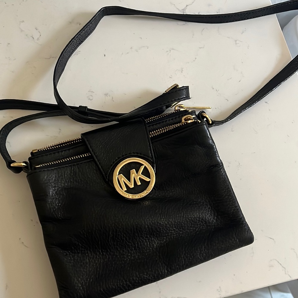 Michael Kors double compartment purse. Black and gold. Lightly used.